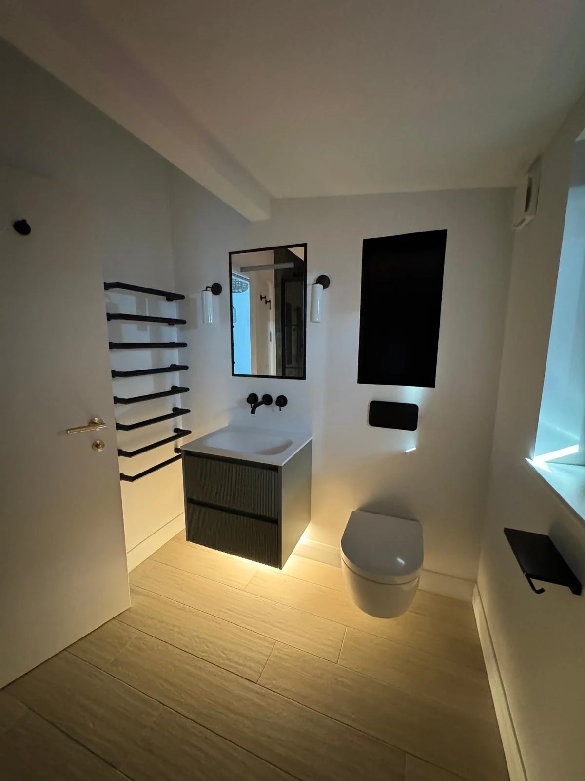 New build bathroom with vanity unit and mirror lighting